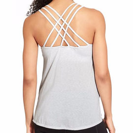 Crossed back design lightweight, body-skimming tank with a step hem eco yoga clothing
